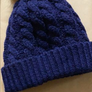 Winter hat with pompom.